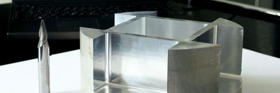 This sample workpiece demonstrates that it can be a short journey from the CAM program to the finished part, using the 5-axis tangent plane machining strategy with a conical barrel cutter. This sample workpiece demonstrates that it can be a short journey from the CAM program to the finished part, using the 5-axis tangent plane machining strategy with a conical barrel cutter.