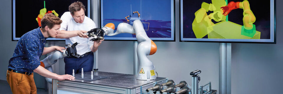 Die intelligente Mensch-Roboter-Kollaboration (iMRK) ermöglicht die gefahrlose Zusammenarbeit von Mensch und Roboter. Die intelligente Mensch-Roboter-Kollaboration (iMRK) ermöglicht die gefahrlose Zusammenarbeit von Mensch und Roboter.