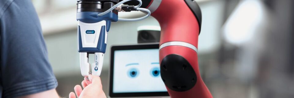 Schunk hat die Co-act Greifer speziell für das Teamwork von Mensch und Maschine konzipiert. Schunk hat die Co-act Greifer speziell für das Teamwork von Mensch und Maschine konzipiert.