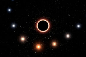 Die künstlerische Darstellung zeigt den Weg des Sterns S2, der sehr nah am supermassiven Schwarzen Loch in der Mitte der Milchstraße vorbeiführt. Das sehr starke Gravitationsfeld bewirkt, dass sich die Farbe des Sterns leicht zum Rot hin verschiebt, ein Effekt von Einsteins allgemeiner Relativitätstheorie. Zur besseren Übersichtlichkeit wurden in dieser Grafik wurden Farbeffekt und Größe der Objekte übertrieben dargestellt Die künstlerische Darstellung zeigt den Weg des Sterns S2, der sehr nah am supermassiven Schwarzen Loch in der Mitte der Milchstraße vorbeiführt. Das sehr starke Gravitationsfeld bewirkt, dass sich die Farbe des Sterns leicht zum Rot hin verschiebt, ein Effekt von Einsteins allgemeiner Relativitätstheorie. Zur besseren Übersichtlichkeit wurden in dieser Grafik wurden Farbeffekt und Größe der Objekte übertrieben dargestellt