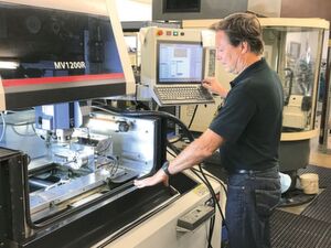 Marcus Alexander on the Mitsubishi wire EDM machine MV1200-R with integrated B-axis from MMK Matsumoto. Marcus Alexander on the Mitsubishi wire EDM machine MV1200-R with integrated B-axis from MMK Matsumoto.