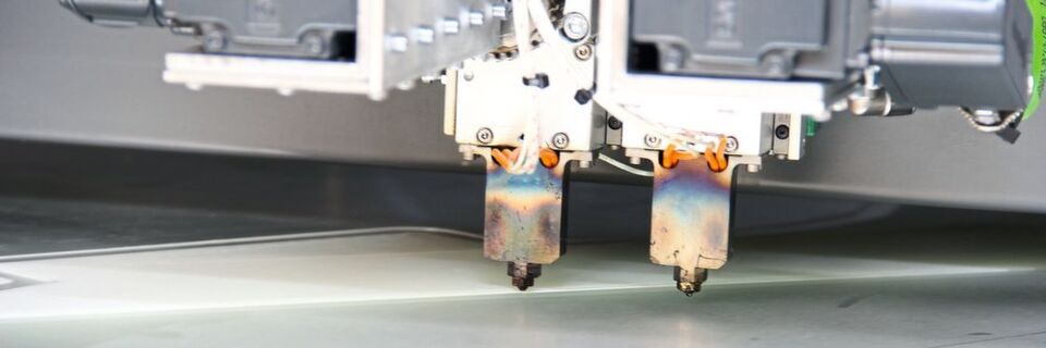 Der HFFS-Druckkopf von Hage 3D mit wassergekühlten Siemens-Servomotoren, im Bild ohne Abdeckung. Der HFFS-Druckkopf von Hage 3D mit wassergekühlten Siemens-Servomotoren, im Bild ohne Abdeckung.