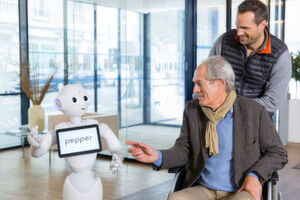 In Deutschland testet die Caritas den Pepper-Roboter in einigen Sozialstationen - mit erfreulichen Ergebnissen: Die betreuten Menschen akzeptieren den Roboter, zeigen sich interessiert und nehmen ihn in ihren Kreis auf, meint Gerhard Schuhmacher, 1. Vorsitzender der Caritas-Sozialstation in Erlenbach. In Deutschland testet die Caritas den Pepper-Roboter in einigen Sozialstationen - mit erfreulichen Ergebnissen: Die betreuten Menschen akzeptieren den Roboter, zeigen sich interessiert und nehmen ihn in ihren Kreis auf, meint Gerhard Schuhmacher, 1. Vorsitzender der Caritas-Sozialstation in Erlenbach.