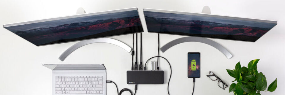 Die Plug-and-Play-Dockingstation bietet eine Dual-Monitor-Unterstützung. Die Plug-and-Play-Dockingstation bietet eine Dual-Monitor-Unterstützung.