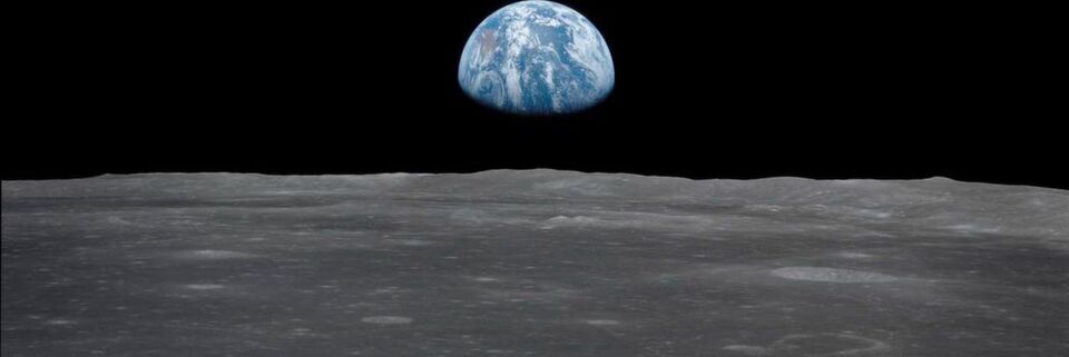Blick vom Mond auf die Erde während der Apollo-11-Mission. Blick vom Mond auf die Erde während der Apollo-11-Mission.