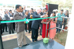 Indian ritual: Dr. Tony Van Osselaer, Member of the Executive Committee of Bayer MaterialScience, at the coconut breaking ceremony. (Picture: Bayer MaterialScience)