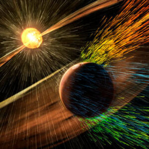Künstlerische Darstellung: Ein Solarsturm trifft den Mars und reißt Ionen aus der oberen Atmosphäre des Planeten mit sich. Neueste Erkenntnisse der MAVEN-Mission (Mars Atmosphere and Volatile Evolution) sehen hierin die Ursache, warum der einst warme und feuchte Mars heute kalt und unwirtlich ist. Künstlerische Darstellung: Ein Solarsturm trifft den Mars und reißt Ionen aus der oberen Atmosphäre des Planeten mit sich. Neueste Erkenntnisse der MAVEN-Mission (Mars Atmosphere and Volatile Evolution) sehen hierin die Ursache, warum der einst warme und feuchte Mars heute kalt und unwirtlich ist.