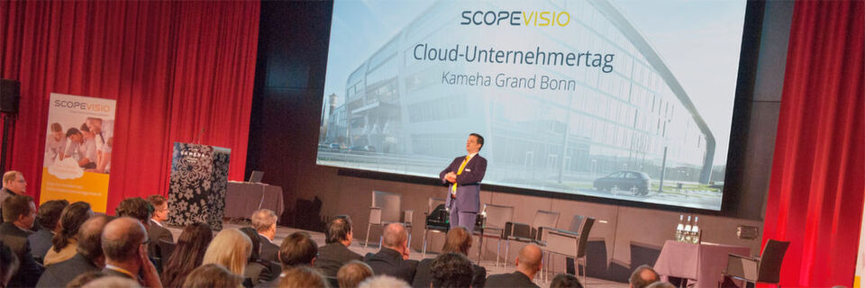 Scopevisio-Vorstand Michael Rosbach auf dem letztjährigen Cloud Unternehmertag im Kameha Grand in Bonn Scopevisio-Vorstand Michael Rosbach auf dem letztjährigen Cloud Unternehmertag im Kameha Grand in Bonn