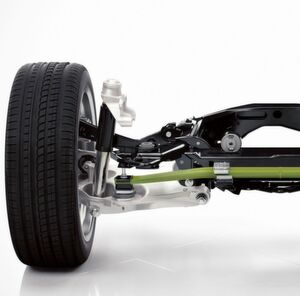 JEC-Highlight von Henkel: Die hintere Achse des neuen Volvo XC90 ist mit einer neuartigen Querblattfeder aus leichtem Faserverbundwerkstoff ausgerüstet (grüngelbes Teil). Benteler-SGL fertigt diese gewichtssenkenden Blattfedern zur Hinterradaufhängung in hohen Stückzahlen aus einem Faserverbundwerkstoff mit einem Loctite Matrixharz von Henkel. JEC-Highlight von Henkel: Die hintere Achse des neuen Volvo XC90 ist mit einer neuartigen Querblattfeder aus leichtem Faserverbundwerkstoff ausgerüstet (grüngelbes Teil). Benteler-SGL fertigt diese gewichtssenkenden Blattfedern zur Hinterradaufhängung in hohen Stückzahlen aus einem Faserverbundwerkstoff mit einem Loctite Matrixharz von Henkel.